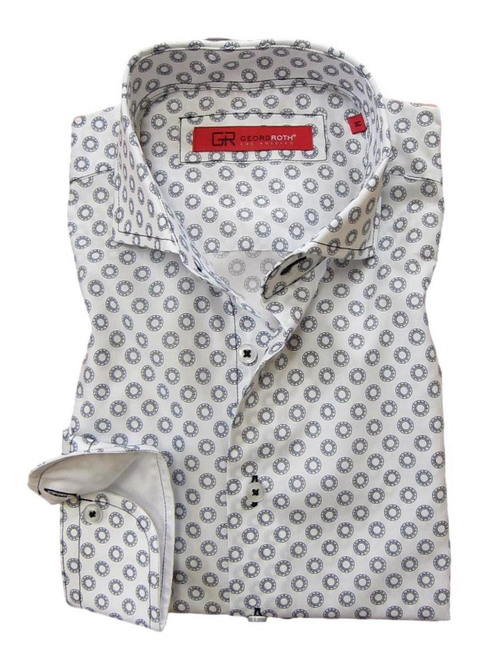 Casual and carefree....!  
You will absolutely love this midnight and white mini print.  
It is a soft cool, crisp Pima cotton fabric for comfort and easy washing.  Great with any jean or pant it will take you anywhere, anytime, day or evening.  
The sleeves having a coordinating white fabric that looks great when the cuffs are rolled.  
A perfect start for the up and coming summer season!
100% Pima Cotton