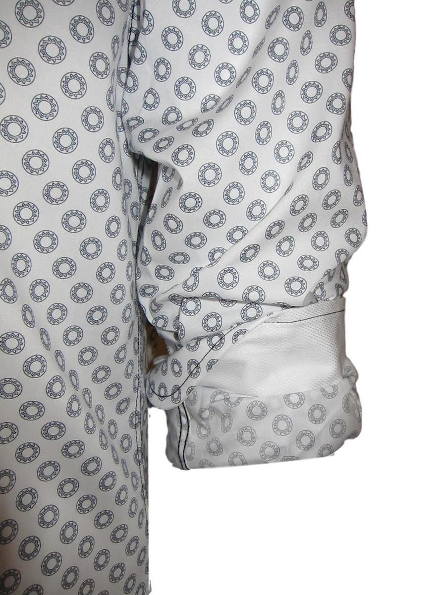 Casual and carefree....!  
You will absolutely love this midnight and white mini print.  
It is a soft cool, crisp Pima cotton fabric for comfort and easy washing.  Great with any jean or pant it will take you anywhere, anytime, day or evening.  
The sleeves having a coordinating white fabric that looks great when the cuffs are rolled.  
A perfect start for the up and coming summer season!
100% Pima Cotton